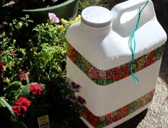 Watering can even has a lovely string for hanging when not in use.