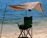 Panel curtain folded in half under light breeze.